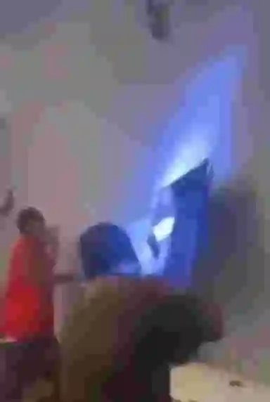 Drama As Angry Fans Destroy Television Over Nigeria’s Tragic AFCON Loss