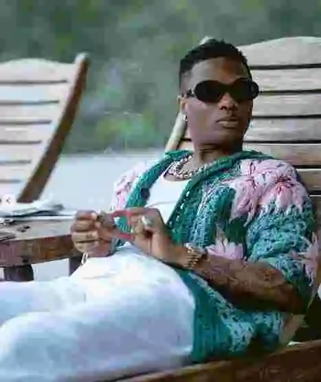 Na Your Papa Business - Wizkid Replies Fan Who Disagreed With Him About Money And Love