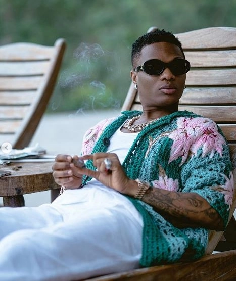 Na Your Papa Business - Wizkid Replies Fan Who Disagreed With Him About Money And Love
